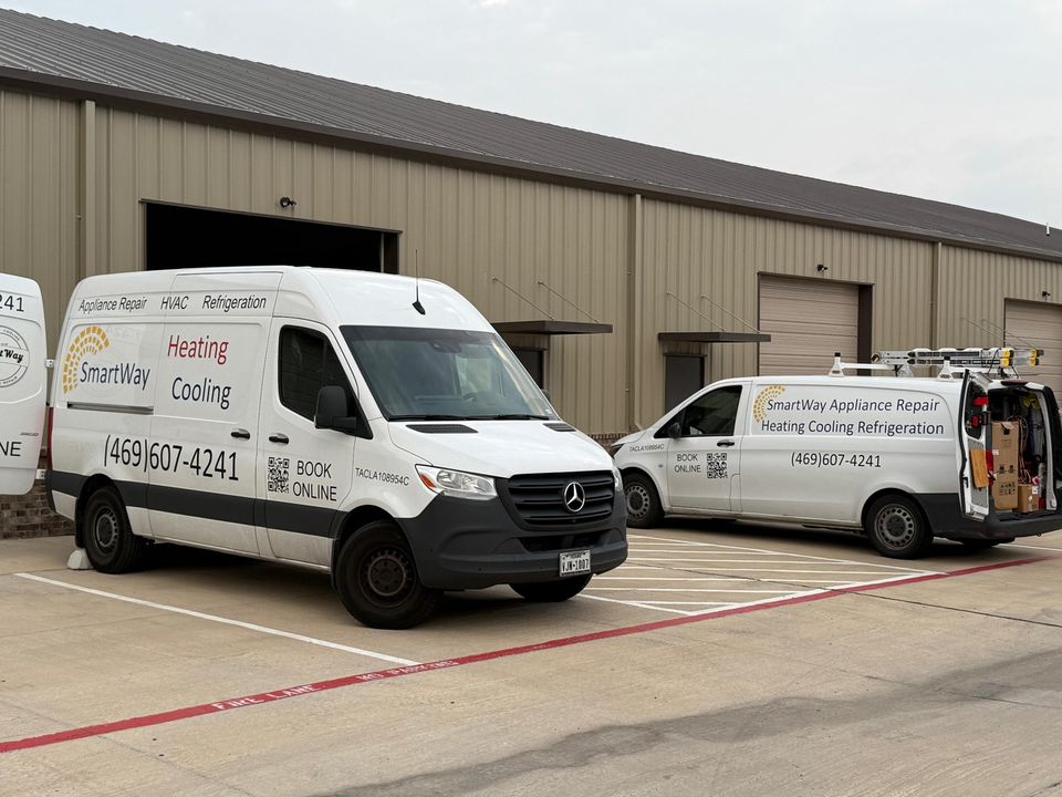 Two of the vans at the shop